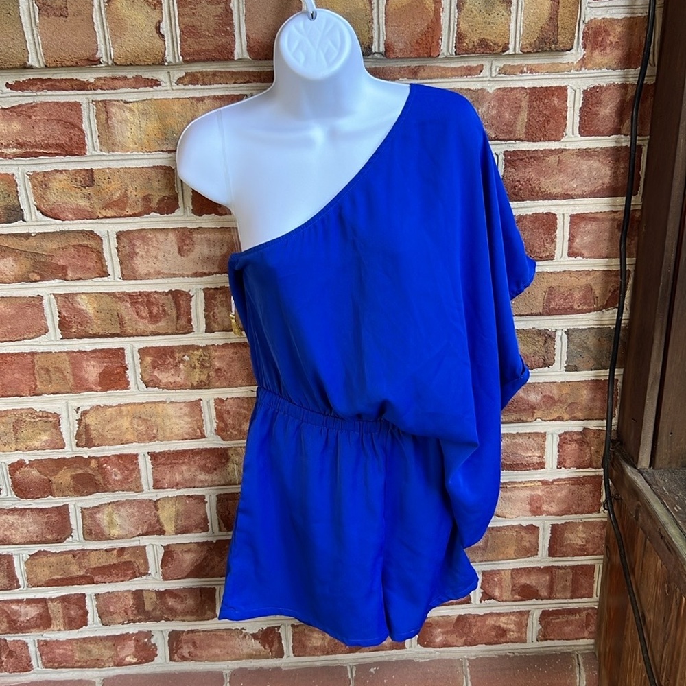 Supreme beautiful blue one shoulder elastic waist romper shorts. Size medium
